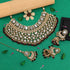 Traditional Kundan bridal jewelry set with choker necklace, jhumka earrings and maang tikka – imitation jewelry from Trenzify Store.