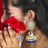 Regal Floral Meenakari Kundan Jhumka Earrings from Trenzify Store.