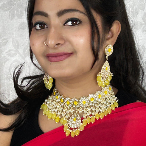 Golden Glow Meenakari Necklace Set with Pearly Layers from Trenzify Store.