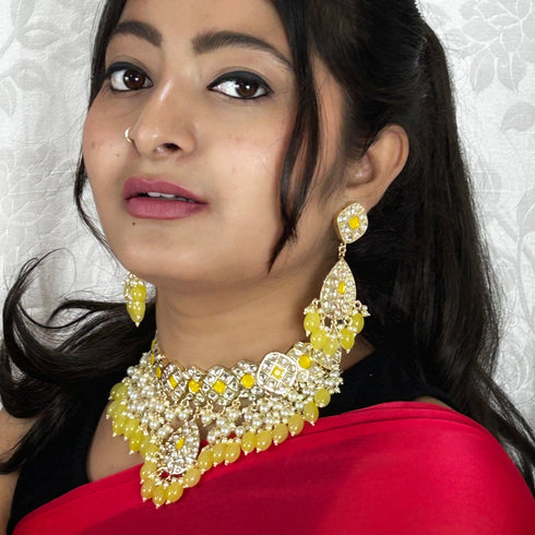 Golden Glow Meenakari Necklace Set with Pearly Layers from Trenzify Store.