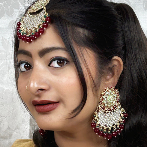 Maroon Beaded Kundan Earrings & Maang Tikka Set from Trenzify Store.