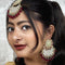 Maroon Beaded Kundan Earrings & Maang Tikka Set from Trenzify Store.