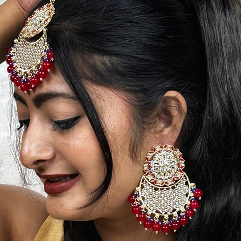 Red Beaded Kundan Earrings & Maang Tikka Set from Trenzify Store.