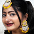 Yellow Beaded Kundan Earrings & Maang Tikka Set from Trenzify Store.