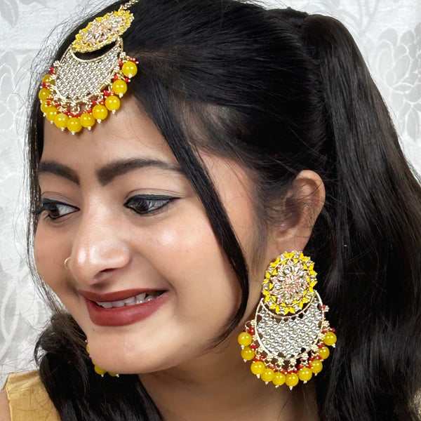 Yellow Beaded Kundan Earrings & Maang Tikka Set from Trenzify Store.
