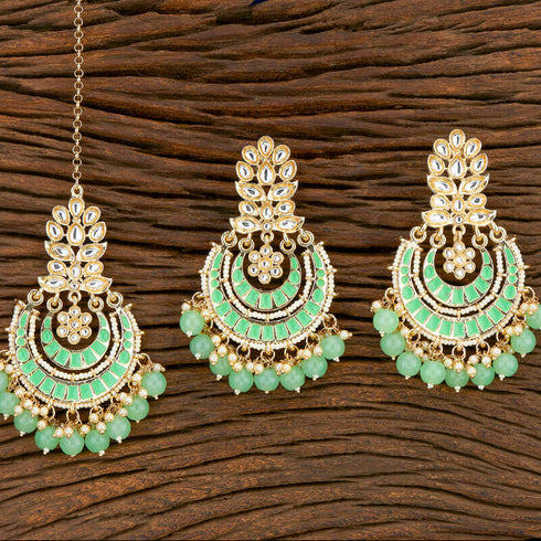 Mint Kundan Pearl Earrings & Maang Tikka Set from Trenzify Store.