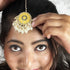 Yellow Enamel Floral Maang Tikka with Pearl Drops from Trenzify Store.