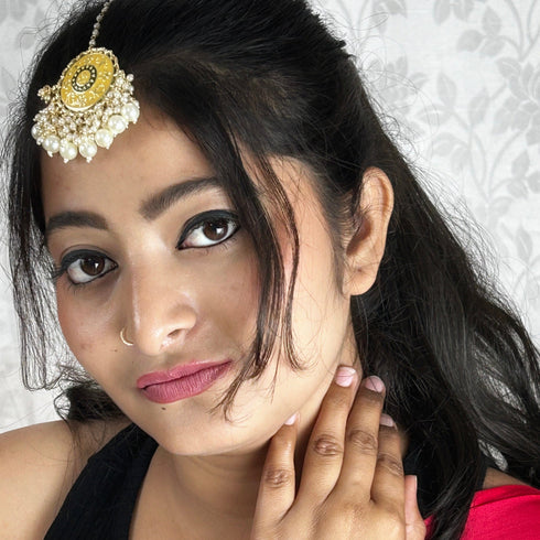 Yellow Enamel Floral Maang Tikka with Pearl Drops from Trenzify Store.