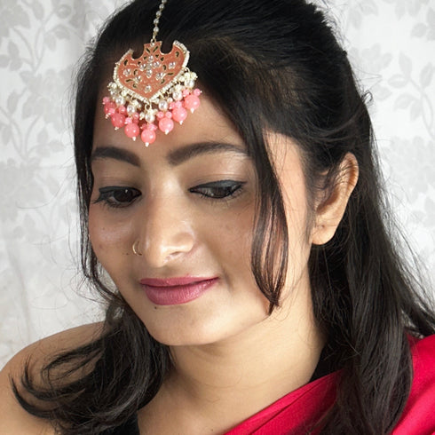 Peach Enamel Floral Maang Tikka with Beaded Drops from Trenzify Store.