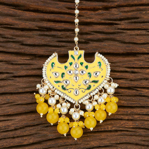 Yellow Enamel Floral Maang Tikka with Beaded Drops from Trenzify Store.