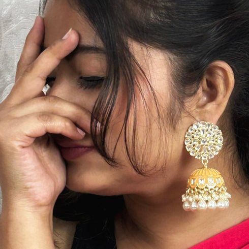 Floral Meenakari Kundan Jhumka Earrings from Trenzify Store.