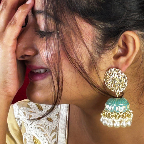 Floral Meenakari Kundan Jhumka Earrings from Trenzify Store.