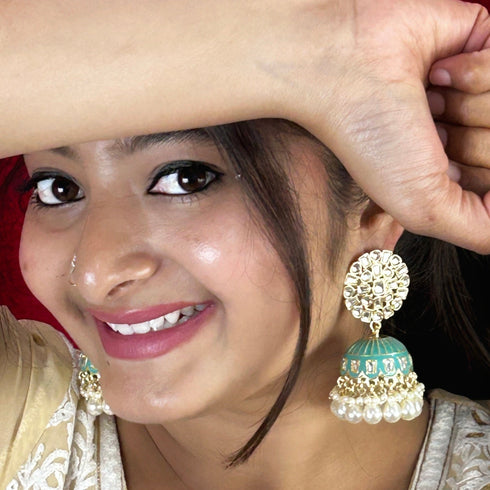 Floral Meenakari Kundan Jhumka Earrings from Trenzify Store.