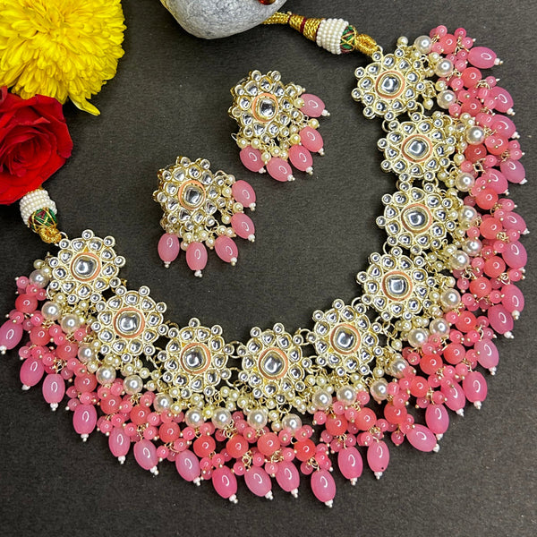 Peach Kundan Necklace Set from Trenzify Store.