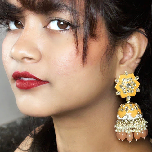Floral Meenakari Kundan Jhumka Earrings from Trenzify Store.