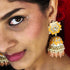 Floral Meenakari Kundan Jhumka Earrings from Trenzify Store.