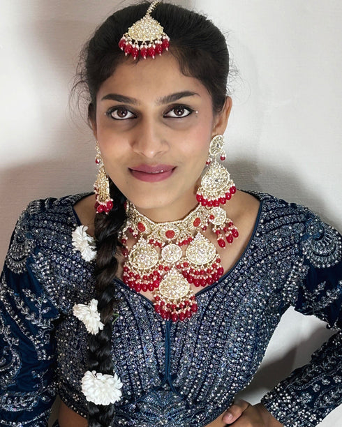 Crimson Red Kundan Necklace, Earrings & Maang Tikka Set from Trenzify Store.