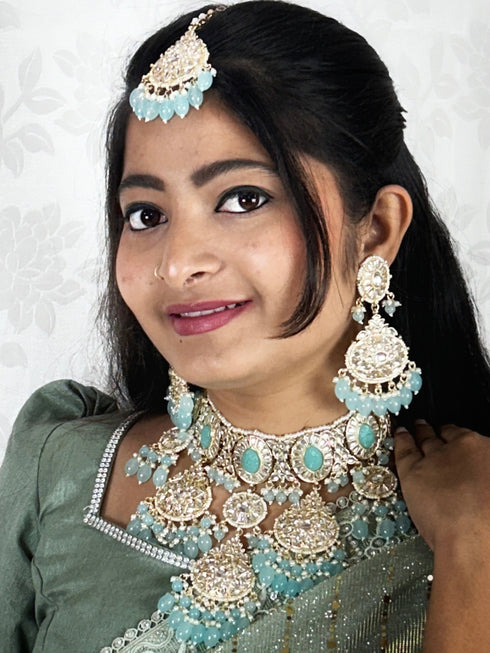Turquoise Kundan Necklace, Earrings & Maang Tikka Set from Trenzify Store.