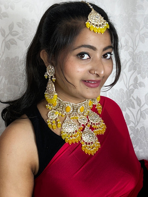 Yellow Beaded Kundan Necklace Set from Trenzify Store.