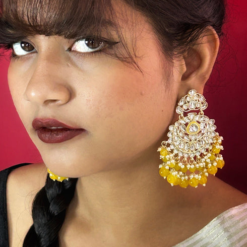 Yellow Beaded Kundan Chandbali Earrings from Trenzify Store.