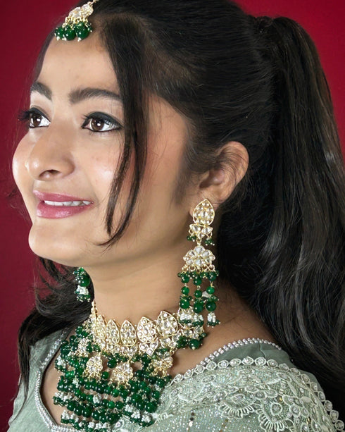 Green Kundan Necklace, Earrings & Maang Tikka Set from Trenzify Store.