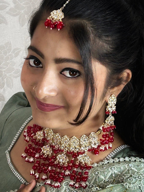 Red Kundan Necklace, Earrings & Maang Tikka Set – Grand Heritage Glow from Trenzify Store.