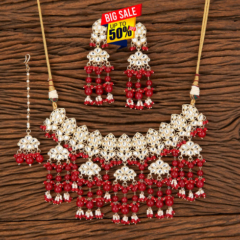 Red Kundan Necklace, Earrings & Maang Tikka Set – Grand Heritage Glow from Trenzify Store.