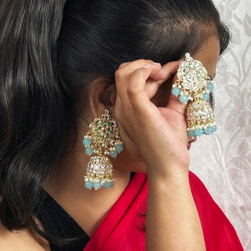 Elegant Kundan Jhumka Earrings from Trenzify Store.