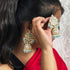 Elegant Kundan Jhumka Earrings from Trenzify Store.