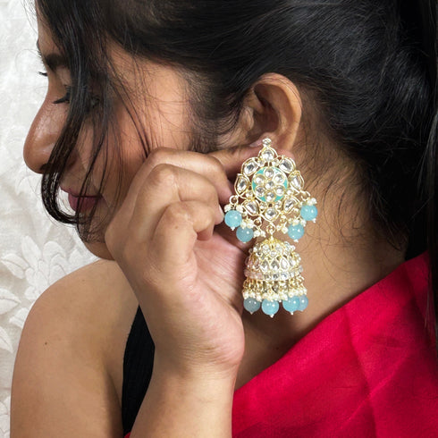 Elegant Kundan Jhumka Earrings from Trenzify Store.