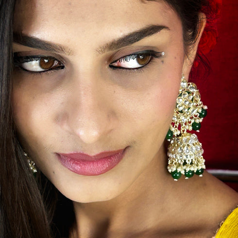 Elegant Kundan Jhumka Earrings from Trenzify Store.