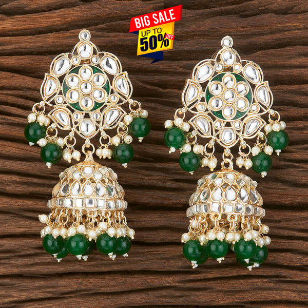 Elegant Kundan Jhumka Earrings from Trenzify Store.