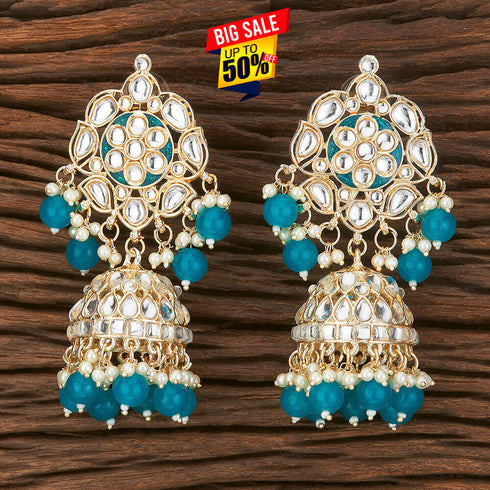 Elegant Kundan Jhumka Earrings from Trenzify Store.