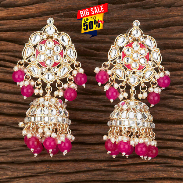 Elegant Kundan Jhumka Earrings from Trenzify Store.