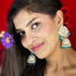 Elegant Kundan Jhumka Earrings from Trenzify Store.