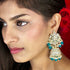 Elegant Kundan Jhumka Earrings from Trenzify Store.