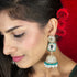 Kundan Dome Jhumka Earrings from Trenzify Store.