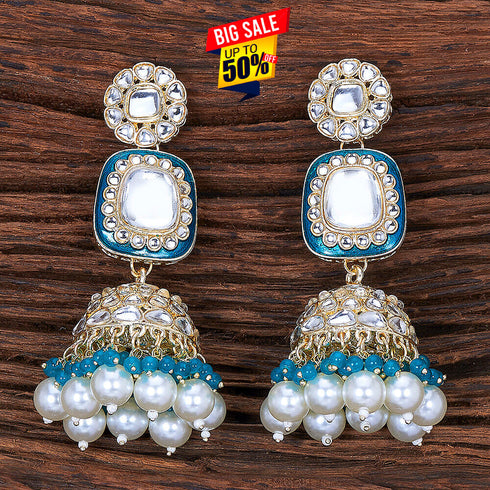Kundan Dome Jhumka Earrings from Trenzify Store.