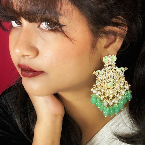 Lotus & Peacock Kundan Earrings from Trenzify Store.