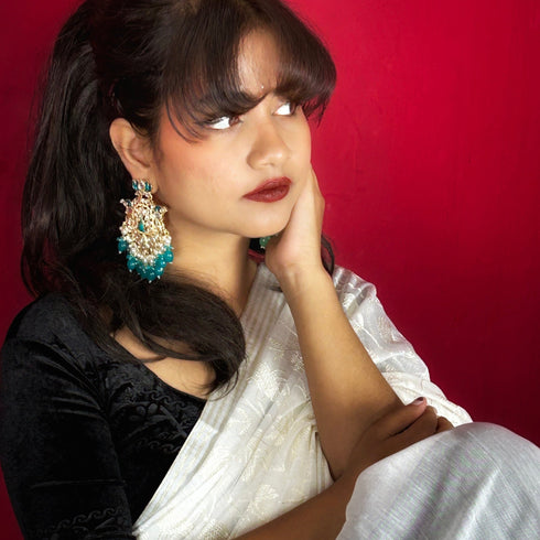 Lotus & Peacock Kundan Earrings from Trenzify Store.