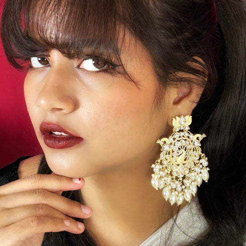 Lotus & Peacock Kundan Earrings from Trenzify Store.