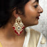 Red Beaded Kundan Chandelier Earrings from Trenzify Store.