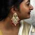 Red Beaded Kundan Chandelier Earrings from Trenzify Store.