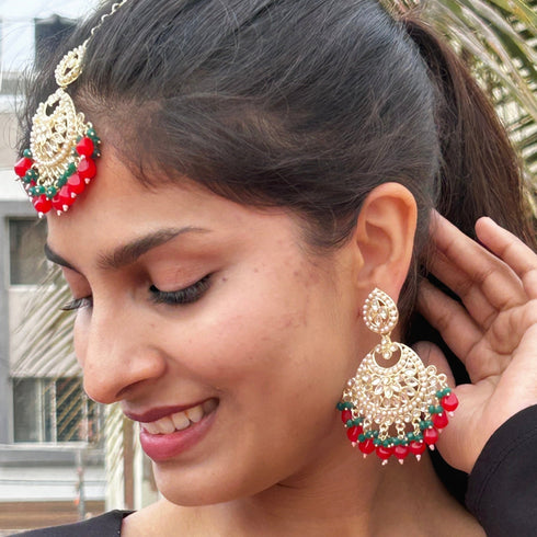 Red and Green Beaded Kundan Earrings and Maang Tikka Set from Trenzify Store.