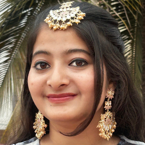 Red and Pearl Kundan Earrings with Maang Tikka from Trenzify Store.