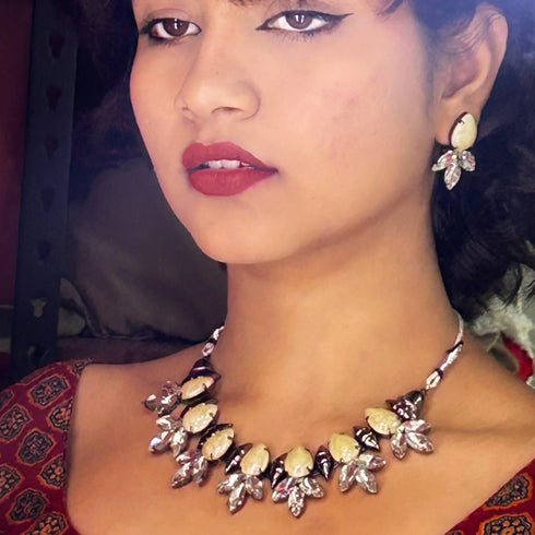 Off-White Leaf-Cut Crystal Oxidised Necklace Set from Trenzify Store.