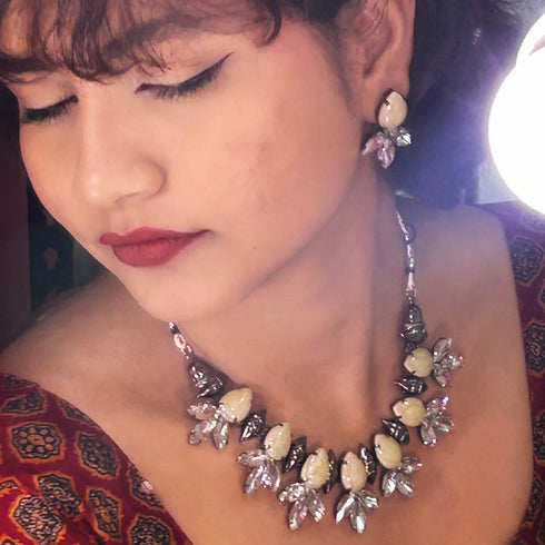 Off-White Leaf-Cut Crystal Oxidised Necklace Set from Trenzify Store.