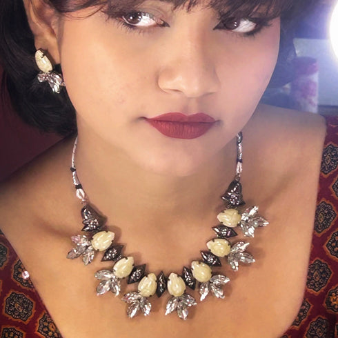 Off-White Leaf-Cut Crystal Oxidised Necklace Set from Trenzify Store.