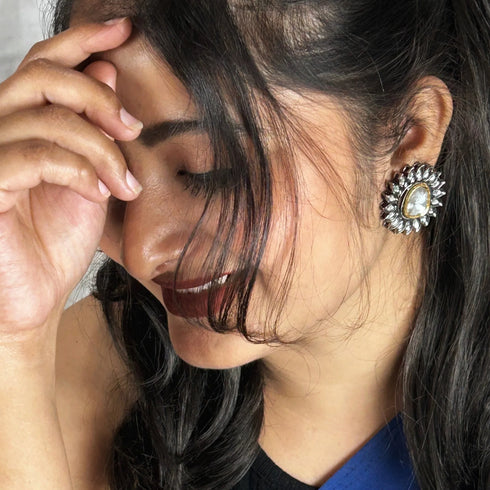 Black Rhodium-Plated Floral Studs from Trenzify Store.