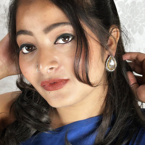 Black Rhodium-Plated Teardrop Studs from Trenzify Store.